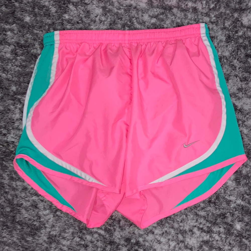 Nike athletic shorts, colors pink and mint green, woman’s size small